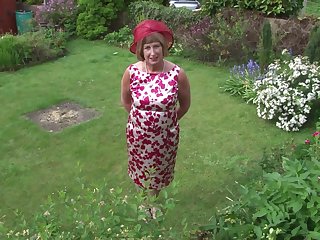 Mature granny Rosemary strips outdoors and plays with a dildo